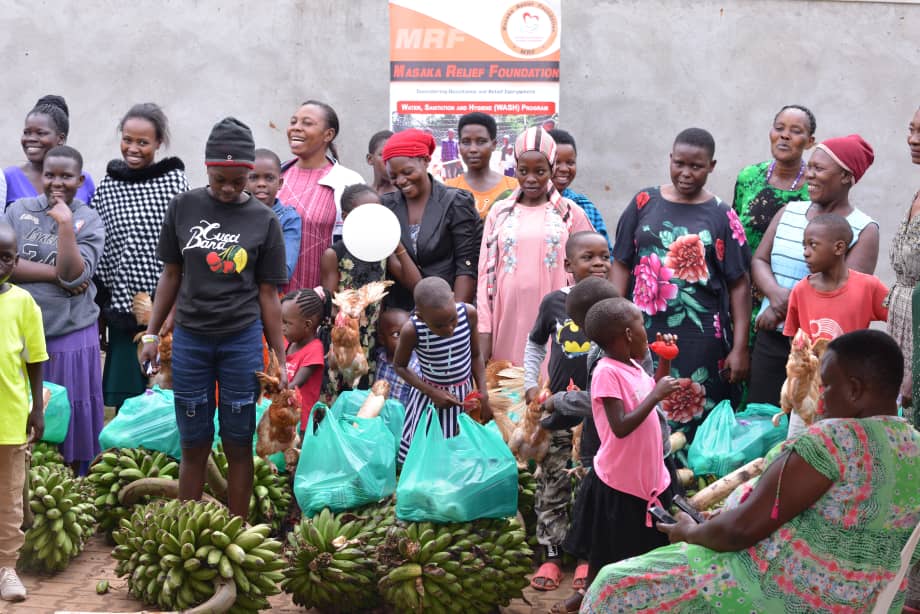 Community poultry and food distribution event with MRF banner