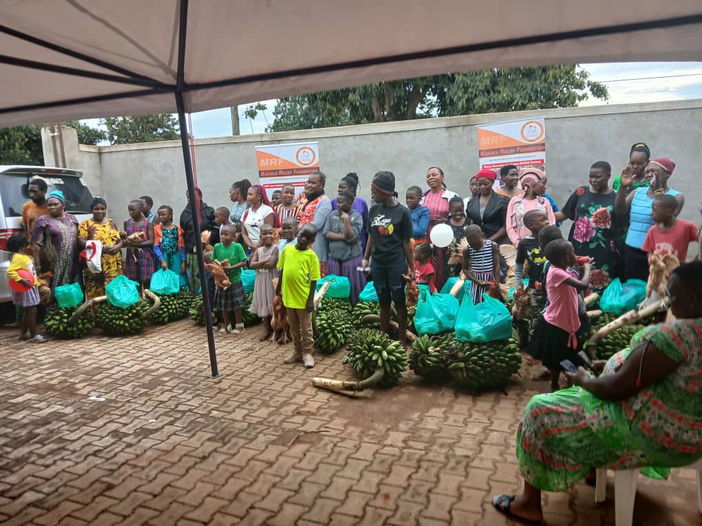 Outdoor food distribution event with community members