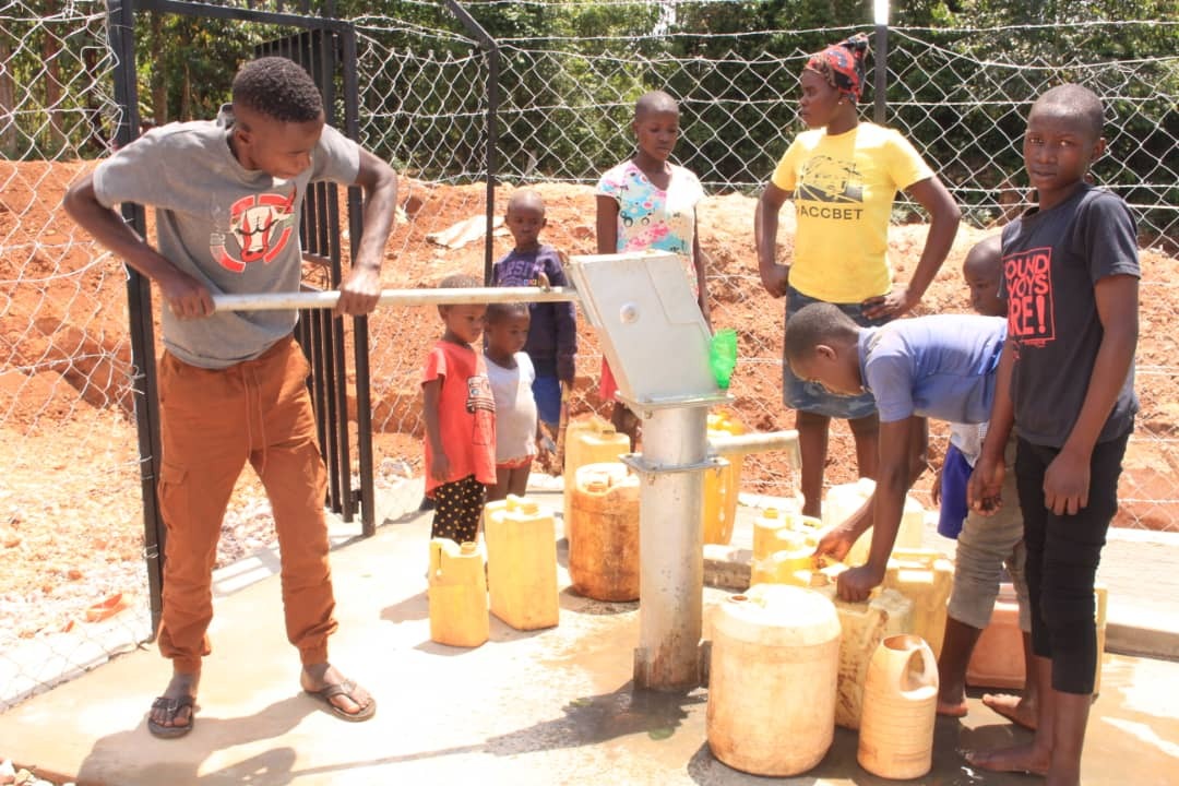 Community members collecting clean water at MRF-installed borehole