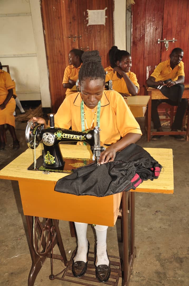 Namanda with her sewing machine provided by MRF for livelihood support